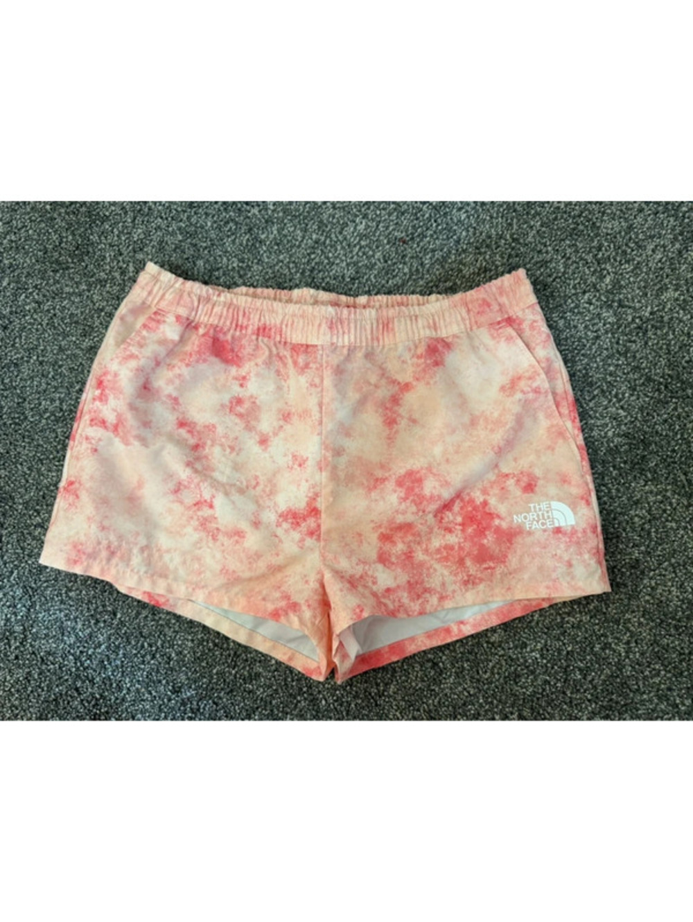 Girl’s North Face pink splash unlined shorts Medium 10/12
